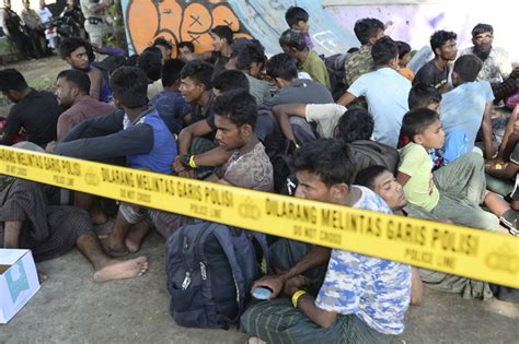 Rohingya Muslims in Indonesia struggle to find shelter. President says government will help for now